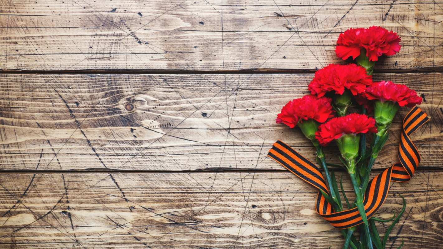 Открытка красные гвоздики на столе  9 мая  From May 9 