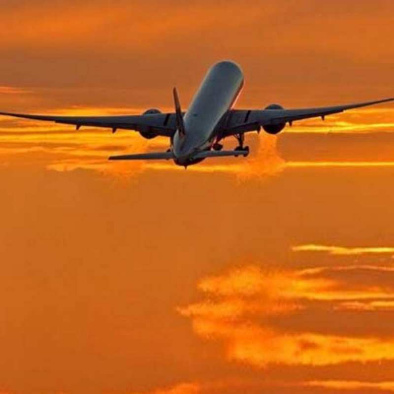 Открытка взлетающий самолет оранжевое небо Have a good trip 