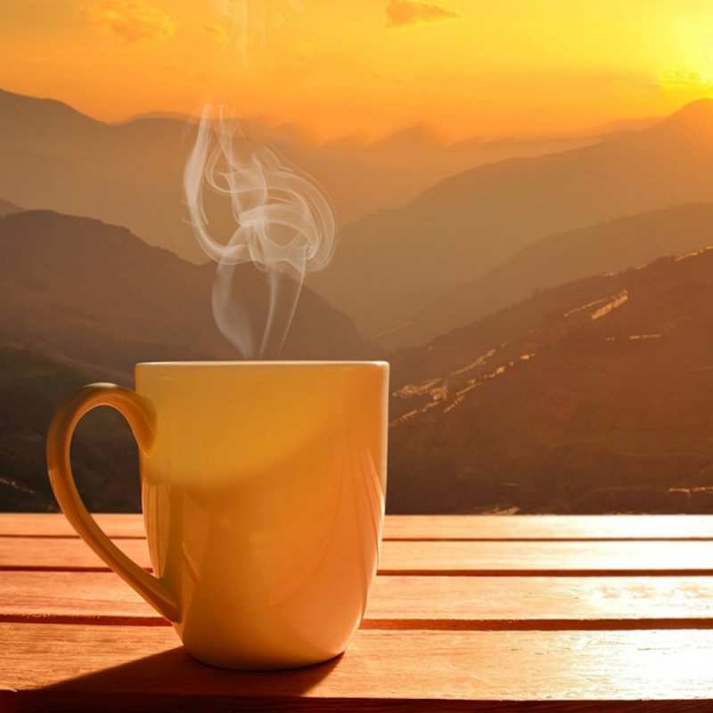 Открытка желтая кружка и пар  кофе в горах  Good morning 