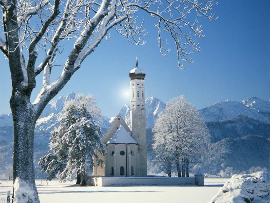 Открытка Храм в зимнем лесу на фоне гор  зима, храм, костел  Merry Christmas 